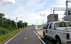 Sakonnet River Bridge bike path; orange barrel marks location of fire