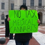 Medical marijuana tax opponents rally at State House