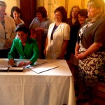 Gov. Raimondo signing bill to give Sec. of State Gorbea authorization to buy new voting equipment.