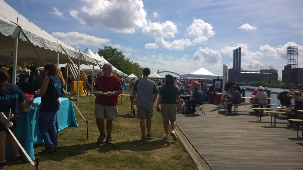 People enjoying the sun and seafood.