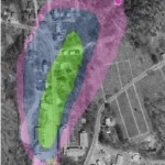 This aerial view of Pascoag shows the MTBE impacted area. The pink dot in the upper right is the villages wellhead. The pink square at the bottom left is the site of the leaking tanks - a property that Conley now owns. (Image courtesy RIDEM)