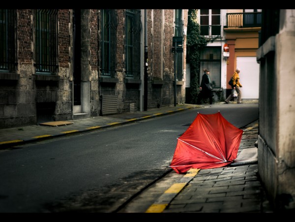 Red umbrella broken