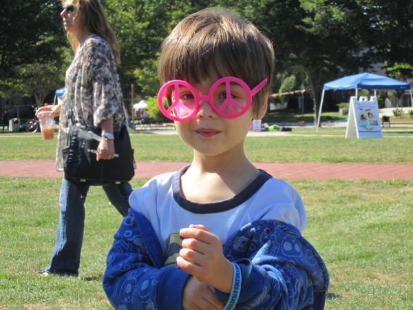 My oldest grandson, and youngest Fossil Free RI member, Octavio, at Peace Day on  Quad at URI