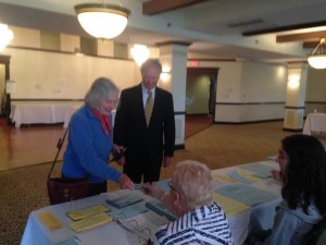 Virginia Chafee shows her id to a poll worker. 