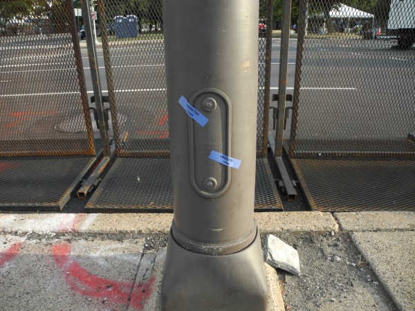 The Secret Service seems to have literally inspected and tagged every panel on every lamppost within and near the frozen zone.