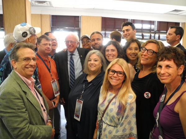 Sen. Bernie Sanders talks with the RI Delegation at the DNC Convention in Philadelphia.