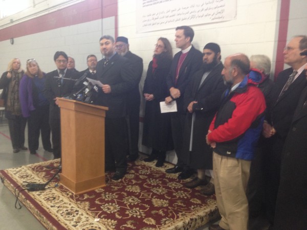 Hilmy Bakri, president of the board of trustees for the Islamic School of Rhode Island, addresses the media. 