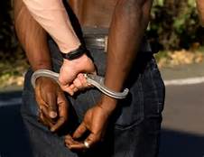 Black man being arrested